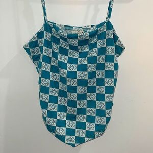 This self esteem checkered daisy top is an amazing light weight summer piece